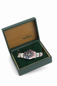 ROLEX : GMT Master Pepsi ref 1675 Long E in acciaio con ghiera girevole bicolore, quadrante nero opaco pallettoni, bracciale Oyster ripiegato, corredato da scatola garanzia e fattura d'acquisto originale  - Asta Orologi da Polso - Associazione Nazionale - Case d'Asta italiane