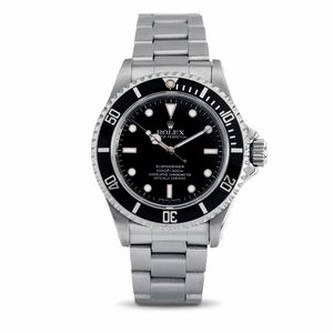 ROLEX - Semplice e sportivo Submariner in acciaio inossidabile, quadrante nero, indici bicchierini Luminova, sfere Mercedes, ghiera girevole, bracciale Oyster con fondello a vite, accompagnato da Scatola e Garanzia<BR>