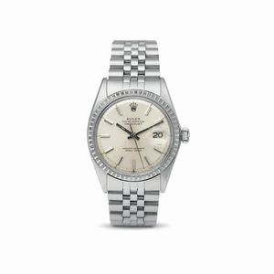 ROLEX - Iconico Datejust ref 1603 in acciaio, quadrante argent, ghiera godronata, bracciale Jubilee corredato da scatola originale e garanzia