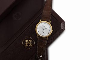 PATEK PHILIPPE : Fine ed elegante, Calatrava Clos de Paris da polso a carica manuale in oro giallo 18 kt, referenza 3919, corredato da scatola e garanzia  - Asta Orologi da Polso - Associazione Nazionale - Case d'Asta italiane