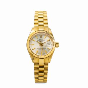 ROLEX - Elegante Datejust Lady ref 6917 in oro giallo 18k, quadrante Argent con ghiera zigrinata e bracciale Jubilee