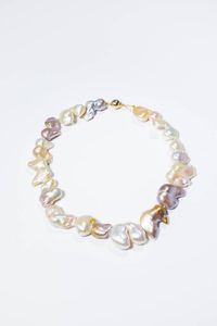 GIROCOLLO - Lunghezza cm 44 composto da un filo di perle di acqua dolce scaramazze nei toni del rosa e del bianco. Chiusura  [..]
