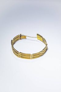 BRACCIALE - Peso gr 21 3 semirigido  in oro giallo  anni '30  composto da segmenti rigidi lavorati e lisci.