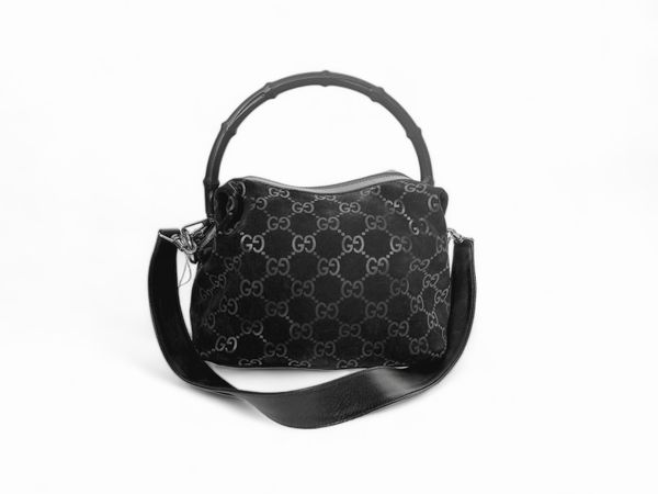 Gucci, Borsa nera in pelle scamosciata GG  - Asta Vintagemania - Associazione Nazionale - Case d'Asta italiane