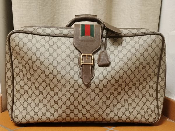 Gucci, valigia morbida in tela monogram GG impermeabilizzata  - Asta Vintagemania - Associazione Nazionale - Case d'Asta italiane