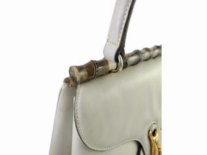 Gucci, Borsa a mano in pelle color riso e bamboo  - Asta Vintagemania - Associazione Nazionale - Case d'Asta italiane