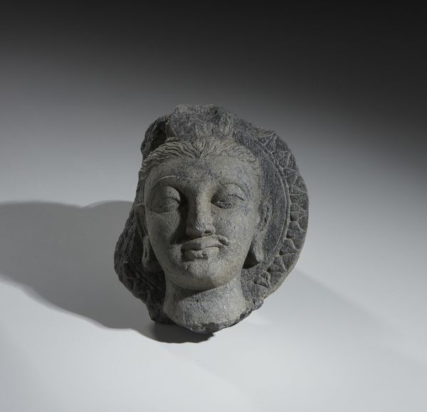 Arte Indiana : Testa di Buddha in scisto.stile Gandhara.  - Asta Asta 437 | ARTE ORIENTALE - ARTE ORIENTALE DA COLLEZIONI PRIVATE ITALIANE Online - Associazione Nazionale - Case d'Asta italiane