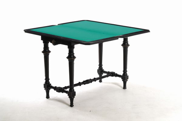 Tavolo da gioco in legno intagliato ed ebanizzato. XIX-XX secolo  - Asta Antiquariato - Associazione Nazionale - Case d'Asta italiane