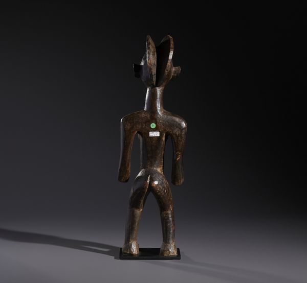 Mossi - Burkina Faso : Nello stile di Scultura antropomorfa femminile  in legno a patina scura  - Asta Asta 444 | AFRICA, OCEANIA E AMERICHE - ARTIGIANATO AFRICANO: VARI COMMITTENTI E SELEZIONE DALLA COLLEZIONE BARTOLOMUCCI Online - Associazione Nazionale - Case d'Asta italiane