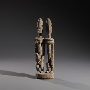 Dogon - Mali - Nello stile di Scultura di coppia ancestrale in legno duro a patina crostosa