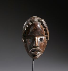 Dan - Costa d'Avorio/Liberia - Nello stile di Maschera antropomorfa in legno duro a patina marrone