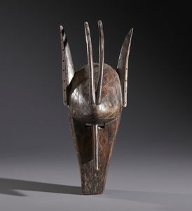 Bambara - Mali - Nello stile di Maschera antropozoomorfa  in legno duro a patina scura