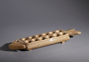 Mossi - Burkina Faso - Nello stile di Gioco con 12 buche in forma di freccia in  legno duro a patina naturale