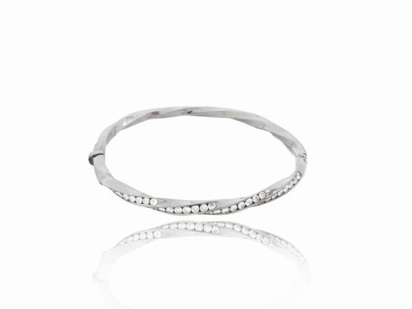 Bracciale rigido in oro bianco con diamanti  - Asta Gioielli e Orologi - Associazione Nazionale - Case d'Asta italiane