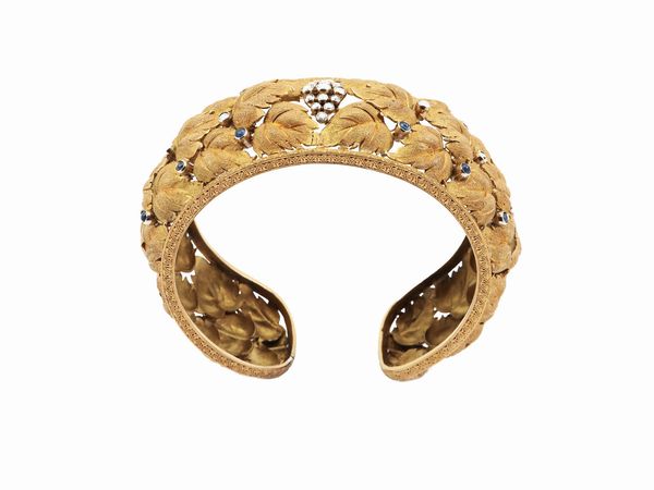 Bracciale rigido in oro giallo con diamanti e zaffiri  - Asta Gioielli e Orologi - Associazione Nazionale - Case d'Asta italiane