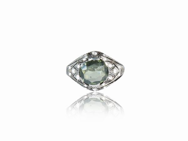 Anello in oro bianco con diamanti e tormalina verde  - Asta Gioielli e Orologi - Associazione Nazionale - Case d'Asta italiane