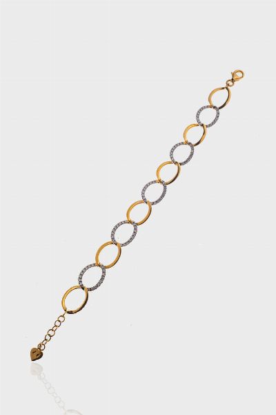 BRACCIALE : Peso gr 8 1 Lunghezza cm 17 composto anelli appiattiti ed ovalizzati in oro bianco e rosa con diamanti taglio brillante per totali ct 0 97 ca  probabile colore G-H  purezza IF-VVS  - Asta Gioielli - Associazione Nazionale - Case d'Asta italiane