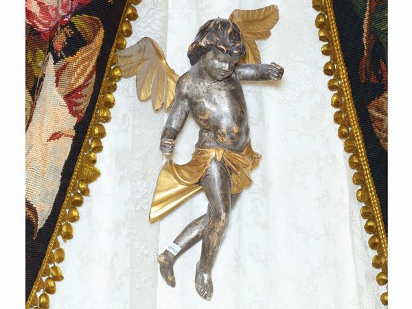 Amgelo per baldacchino in legno intagliato, dorato e argentato  - Asta Casa Lazzi - parte prima Arredi, dipinti, vetri di Murano, curiosit - Associazione Nazionale - Case d'Asta italiane