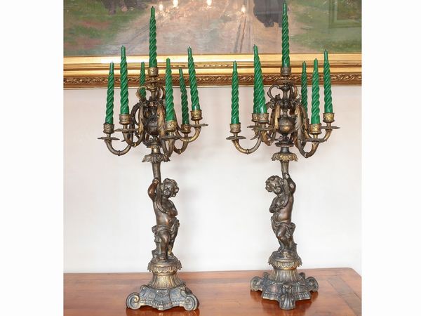 Coppia di candelabri in antimonio dorato e patinato  - Asta Casa Lazzi - parte prima Arredi, dipinti, vetri di Murano, curiosit - Associazione Nazionale - Case d'Asta italiane