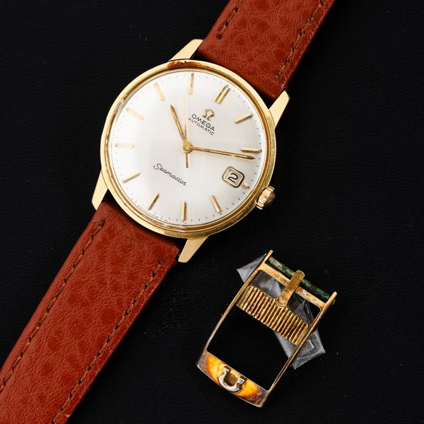 OMEGA : Seamaster Automatic in oro giallo 18k cassa con fondo a vite, quadrante Argent indici applicati con datario, 34 mm  - Asta Watches - Associazione Nazionale - Case d'Asta italiane