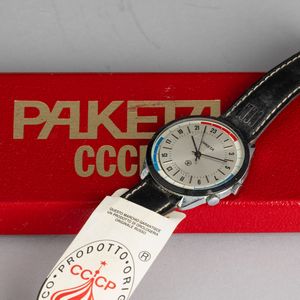 Paketa : Ore del Mondo in metallo cromato carica manuale con doppia corona, corredato da astuccio originale in ottimo stato di conservazione, 38 mm  - Asta Watches - Associazione Nazionale - Case d'Asta italiane