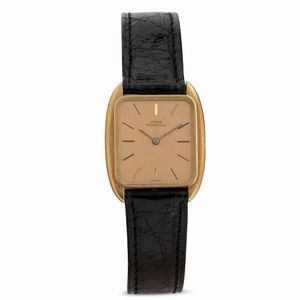 GIRARD PERREGAUX - Solo tempo in oro giallo di forma tonneau 18k carica manuale, quadrante champagne con indici applicati, 24x27 mm