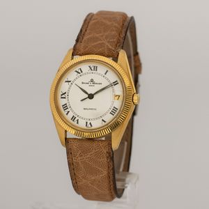 Baume & Mercier : Baume & Mercier Baumatic in oro giallo 18k, movimento automatico con datario, quadrante bianco con numeri romani completo di scatola e garanzia, 36 mm, circa 1978  - Asta Watches - Associazione Nazionale - Case d'Asta italiane