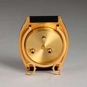 CARTIER : Pendoletta con sveglia da viaggio in ottone dorato al quarzo 88x74 mm  - Asta Watches - Associazione Nazionale - Case d'Asta italiane