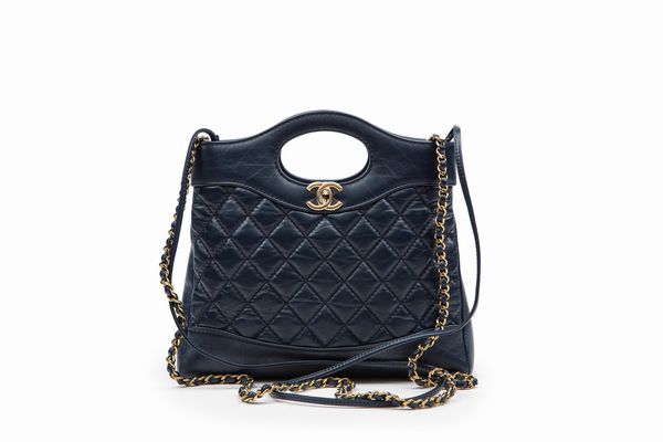 CHANEL : Borsa con maniglie ad oblo  - Asta Luxury Fashion - Associazione Nazionale - Case d'Asta italiane