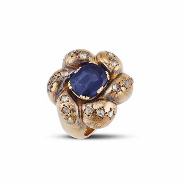 ANELLO A FORMA DI FIORE CON ZAFFIRO KASHMIR E DIAMANTI  - Asta Gioielli - Associazione Nazionale - Case d'Asta italiane