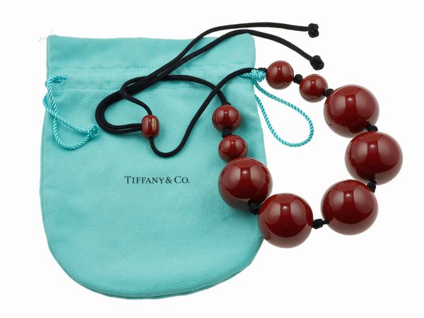 Tiffany & Co. by Elsa Peretti. Girocollo Sphere in lacca marrone su legno  - Asta Fine Jewels - Associazione Nazionale - Case d'Asta italiane