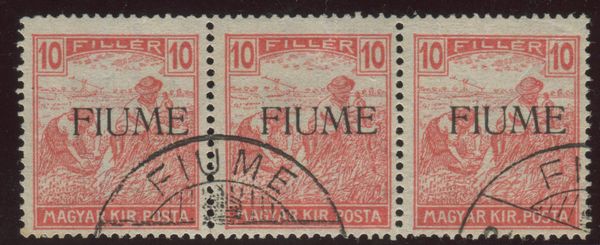 1918, Fiume, serie Mietitori, 10 filler carminio striscia di tre usata.  - Asta Filatelia e Storia Postale - Associazione Nazionale - Case d'Asta italiane