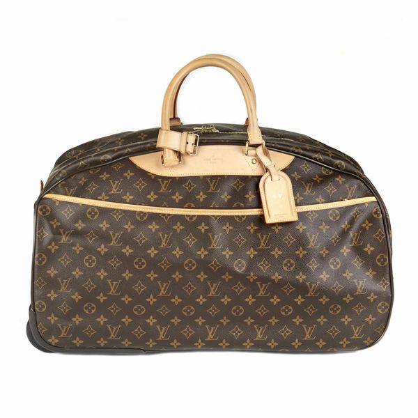 LOUIS VUITTON SACCA TROLLEY EOLE 50  - Asta Vintage: borse e accessori di hermes, louis vuitton e altre grandi maison - Associazione Nazionale - Case d'Asta italiane