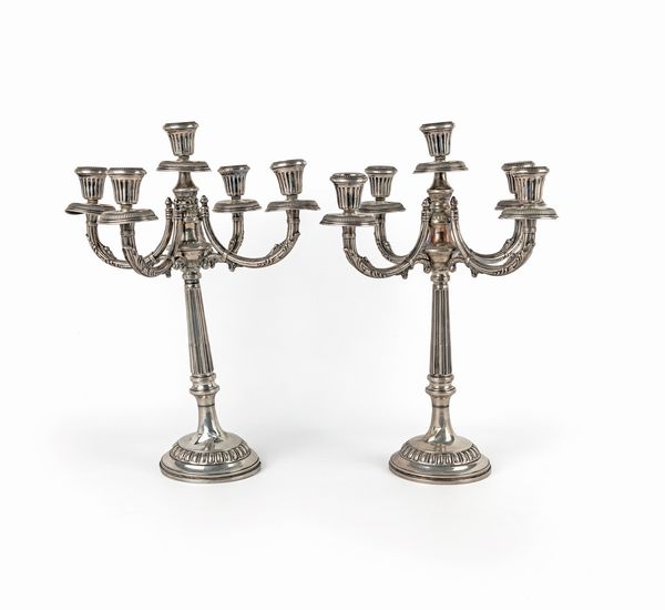 Coppia di candelabri a cinque luci  - Asta Argenti Antichi e da Collezione - Associazione Nazionale - Case d'Asta italiane