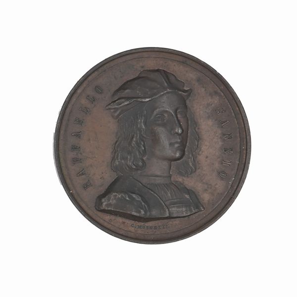 Carlo Moscetti : Medaglia in bronzo commemorativa di Raffaello Sanzio (1483-1520) per ricordare il quarto centenario della nascita; datata 1883 e firmata Moscetti D/ Busto del pittore con berretto R/ L'ASSOCIAZIONE ARTISTICA INTERNAZIONALE DI ROMA NEL IV CENTENARIO DELLA NASCITA DEL SOMMO MAESTRO XXVIII  MARZO MDCCCLXXXIII  - Asta Numismatica - Associazione Nazionale - Case d'Asta italiane