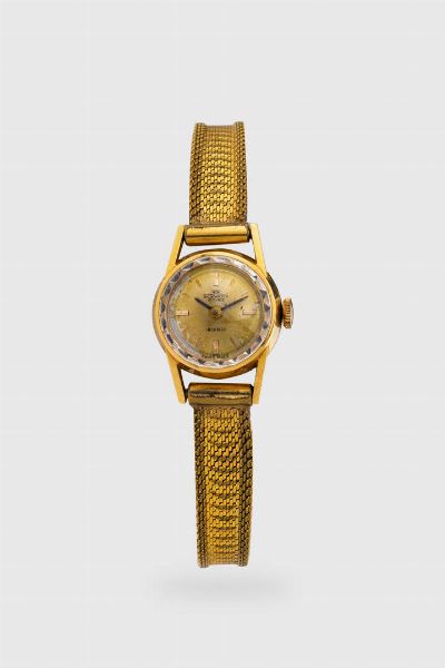 DICHI WATCH : Diam. 17 mm Cassa in oro con fondello a scatto. Quadrante champagne con indici geometrici applicati.  Movimento a carica manuale e bracciale placcato.  - Asta Orologi  - Associazione Nazionale - Case d'Asta italiane