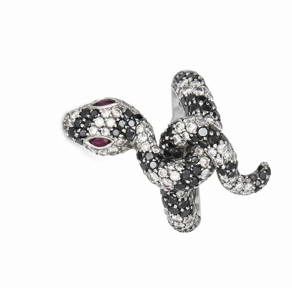 Anello a serpente in oro,  brillanti e rubini  - Asta Importanti Gioielli e Orologi da polso e da tasca - Associazione Nazionale - Case d'Asta italiane