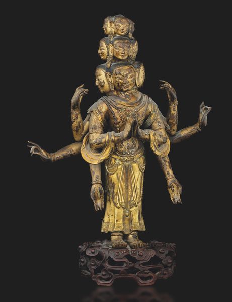 Figura di Avalokiteshvara in rame dorato su base in legno scolpita, Tibet, XVII secolo  - Asta Fine Asian Works of Art - Associazione Nazionale - Case d'Asta italiane