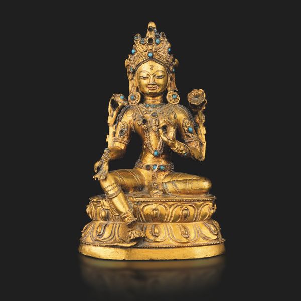 Figura di Tara seduto su doppio fior di loto in bronzo dorato, tracce di policromia e innesti in turchese, Tibet, XVII -  XVIII secolo  - Asta Fine Asian Works of Art - Associazione Nazionale - Case d'Asta italiane