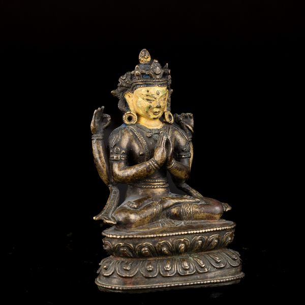 Figura di Shadakshara seduto su doppio fior di loto in bronzo parzialmente dorato e freddo, Tibet, XVIII secolo  - Asta Fine Asian Works of Art - Associazione Nazionale - Case d'Asta italiane