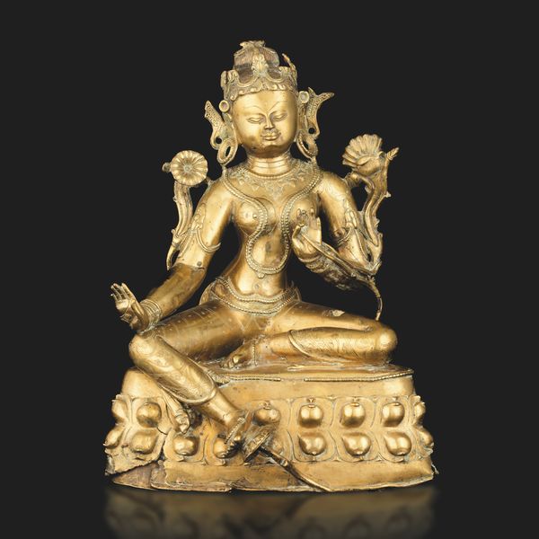 Importante figura di Tara seduta su doppio fiore di loto in bronzo con tracce di policromia, Tibet, XIII secolo  - Asta Fine Asian Works of Art - Associazione Nazionale - Case d'Asta italiane