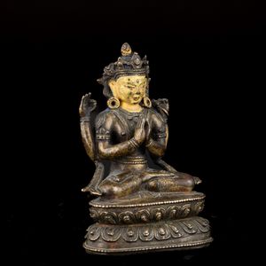 Figura di Shadakshara seduto su doppio fior di loto in bronzo parzialmente dorato e freddo, Tibet, XVIII secolo  - Asta Fine Asian Works of Art - Associazione Nazionale - Case d'Asta italiane