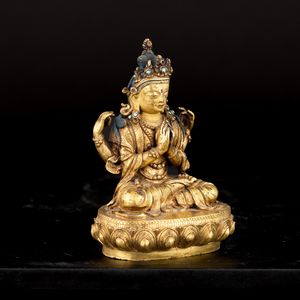 Figura di SHADAKSHARA AVALOKITESVARA seduto su fior di loto in bronzo dorato, tracce di policromia e innesti in turchese, Mongolia, XVII - XVIII<BR>  - Asta Fine Asian Works of Art - Associazione Nazionale - Case d'Asta italiane