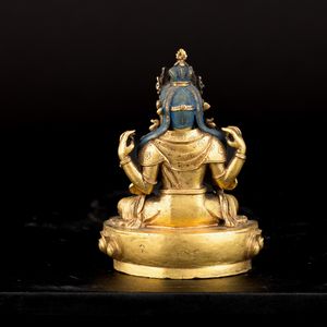 Figura di SHADAKSHARA AVALOKITESVARA seduto su fior di loto in bronzo dorato, tracce di policromia e innesti in turchese, Mongolia, XVII - XVIII<BR>  - Asta Fine Asian Works of Art - Associazione Nazionale - Case d'Asta italiane