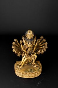 Figura di Guhyasamaja in Yab-Yum stante su doppio fiore di loto in bronzo dorato con tracce di policromia, Tibet, XIX secolo  - Asta Fine Asian Works of Art - Associazione Nazionale - Case d'Asta italiane