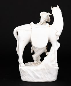 Gruppo in porcellana Blanc de Chine raffigurante uomo e cavallo con catena, Cina, Dinastia Qing, epoca Daoguang, fine XIX secolo  - Asta Fine Asian Works of Art - Associazione Nazionale - Case d'Asta italiane