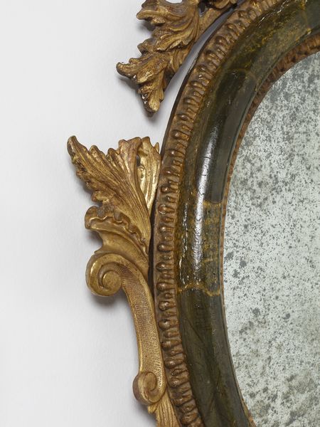 MANIFATTURA VENEZIANA DEL XVIII SECOLO : Quattro specchiere in legno parzialmente dorato e laccato a finto marmo verde, decorazioni esterne in legno intagliato e dorato a motivi fitomorfi e a volute, maschera grottesca a supporto della parte inferiore  - Asta Asta 460 | ARTE ANTICA E DEL XIX SECOLO - Da una dimora veneta e altre committenze Tradizionale - Associazione Nazionale - Case d'Asta italiane