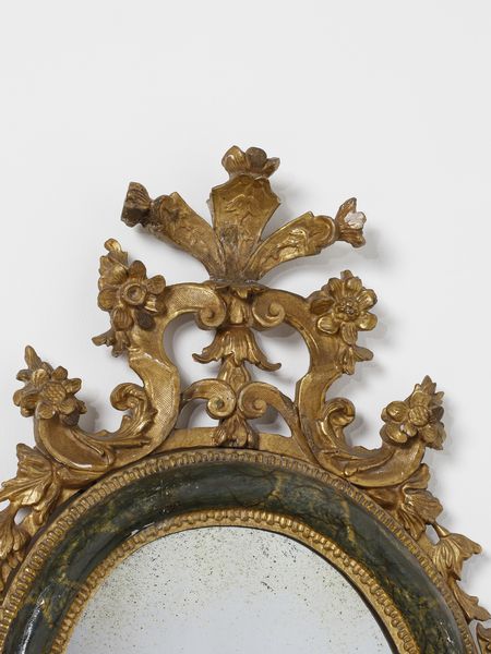 MANIFATTURA VENEZIANA DEL XVIII SECOLO : Quattro specchiere in legno parzialmente dorato e laccato a finto marmo verde, decorazioni esterne in legno intagliato e dorato a motivi fitomorfi e a volute, maschera grottesca a supporto della parte inferiore  - Asta Asta 460 | ARTE ANTICA E DEL XIX SECOLO - Da una dimora veneta e altre committenze Tradizionale - Associazione Nazionale - Case d'Asta italiane