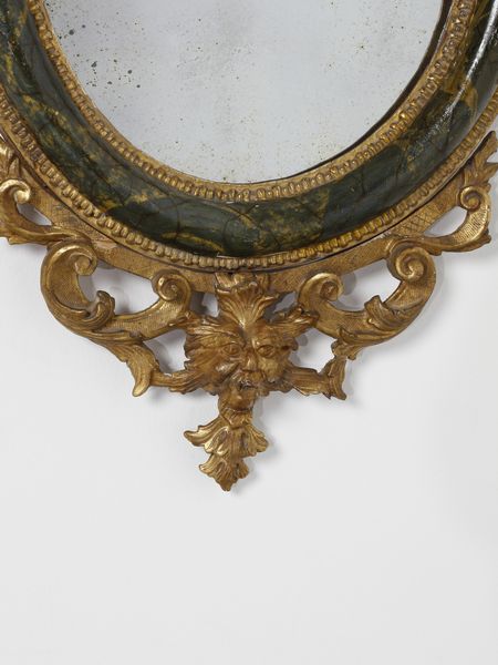 MANIFATTURA VENEZIANA DEL XVIII SECOLO : Quattro specchiere in legno parzialmente dorato e laccato a finto marmo verde, decorazioni esterne in legno intagliato e dorato a motivi fitomorfi e a volute, maschera grottesca a supporto della parte inferiore  - Asta Asta 460 | ARTE ANTICA E DEL XIX SECOLO - Da una dimora veneta e altre committenze Tradizionale - Associazione Nazionale - Case d'Asta italiane