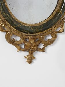 MANIFATTURA VENEZIANA DEL XVIII SECOLO : Quattro specchiere in legno parzialmente dorato e laccato a finto marmo verde, decorazioni esterne in legno intagliato e dorato a motivi fitomorfi e a volute, maschera grottesca a supporto della parte inferiore  - Asta Asta 460 | ARTE ANTICA E DEL XIX SECOLO - Da una dimora veneta e altre committenze Tradizionale - Associazione Nazionale - Case d'Asta italiane